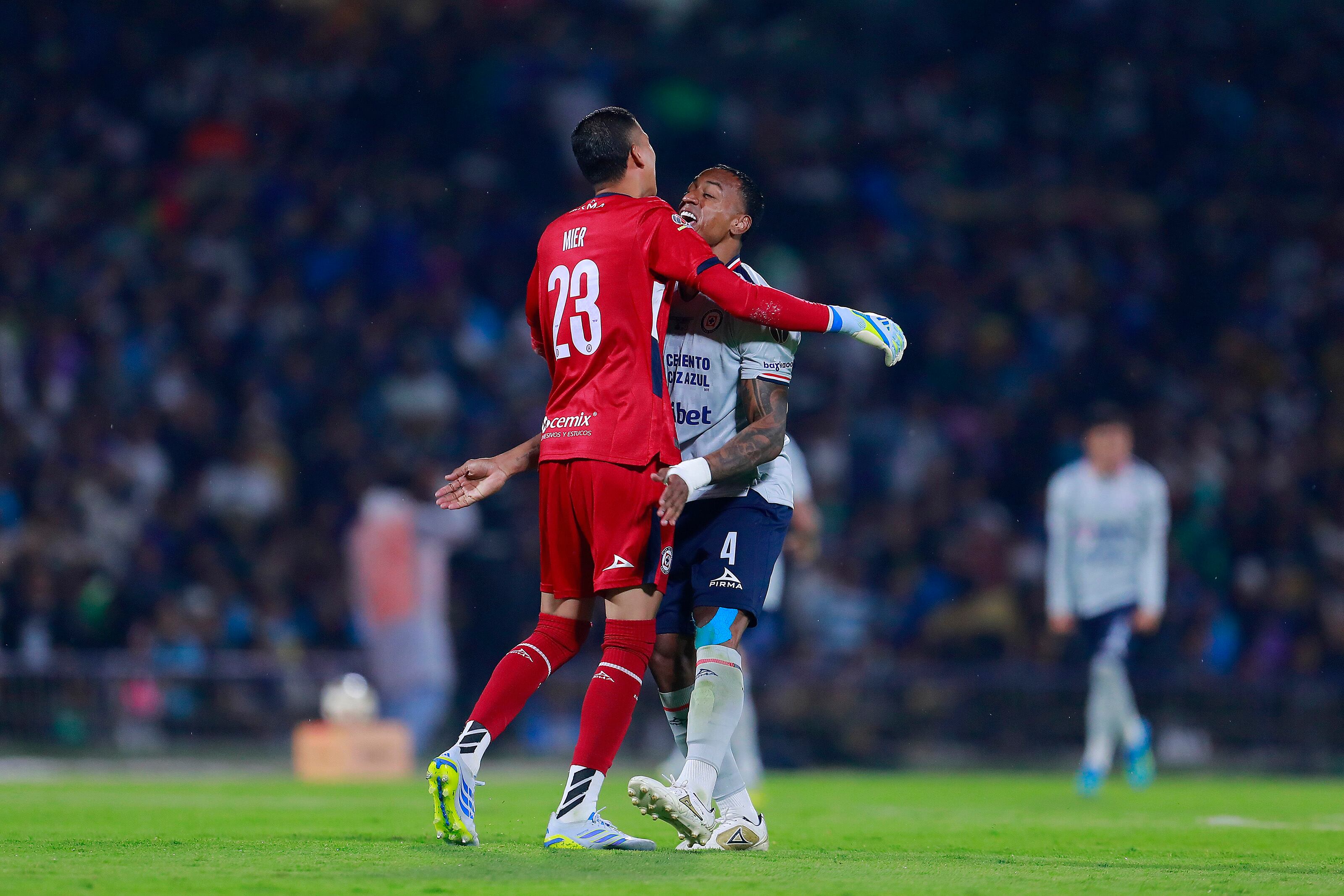 MEXICO CITY, MEXICO - MAY 24: Goalkeeper Kevin Mier, and Willer Ditta (R) of Cruz Azul celebrate after the first goal of their team during the final second leg match between Pumas UNAM and Cruz Azul as part of the Torneo Clausura 2026 Liga MX at Olimpico Universitario Stadium on May 24, 2026 in Mexico City, Mexico. (Photo by Mauricio Salas/Jam Media/Getty Images)