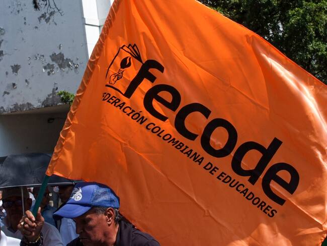 A flag of Colombia&#039;s national federation of educators &#039;Fecode&#039; is seen during a demonstration demanding Colombia&#039;s Supreme Court to elect the countries new attorney general in Cali, Colombia, February 8, 2024. (Photo by: Sebastian Marmolejo/Long Visual Press/Universal Images Group via Getty Images)