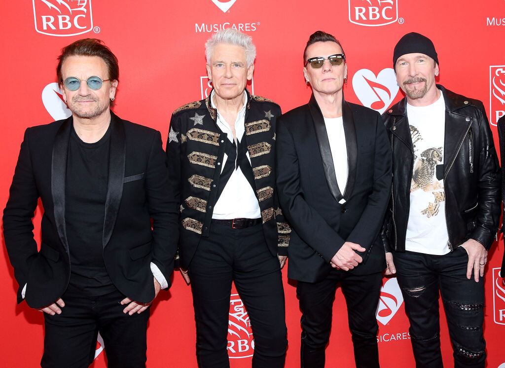 NEW YORK, NY - JUNE 26: Bono, Adam Clayton, Larry Mullen, and The Edge of U2 attend 13th Annual Musicares MAP Fund Benefit Concert Honoring Adam Clayton at PlayStation Theater on June 26, 2017 in New York City.  (Photo by Robin Marchant/WireImage,)
