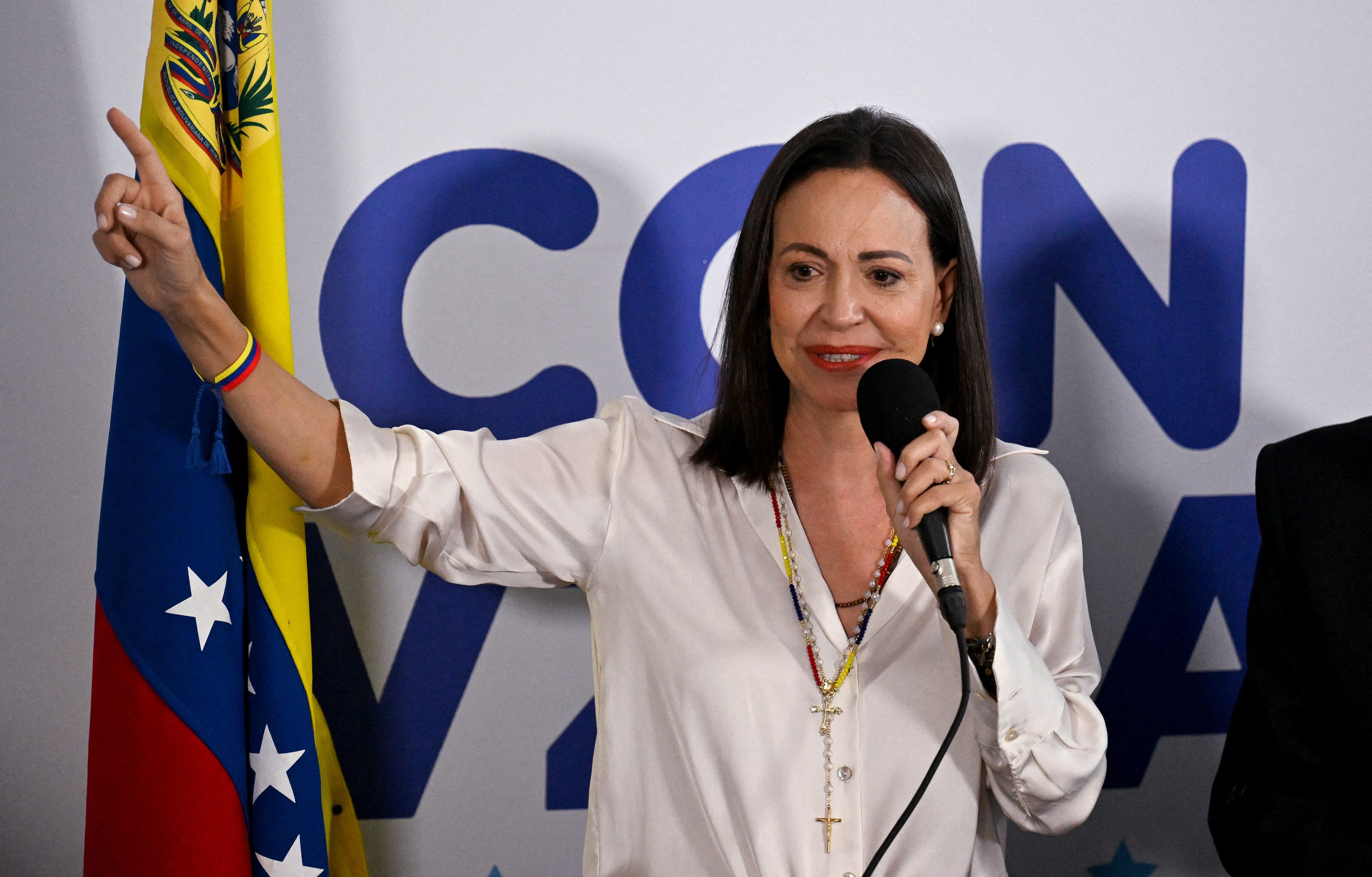 Venezuelan opposition leader Maria Corina Machado talks to the media in Caracas on July 29, 2024, a day after the Venezuelan presidential election. Protests erupted in parts of Caracas Monday against the re-election victory claimed by Venezuelan President Nicolas Maduro but disputed by the opposition and questioned internationally, AFP journalists observed. (Photo by JUAN BARRETO / AFP) (Photo by JUAN BARRETO/AFP via Getty Images)