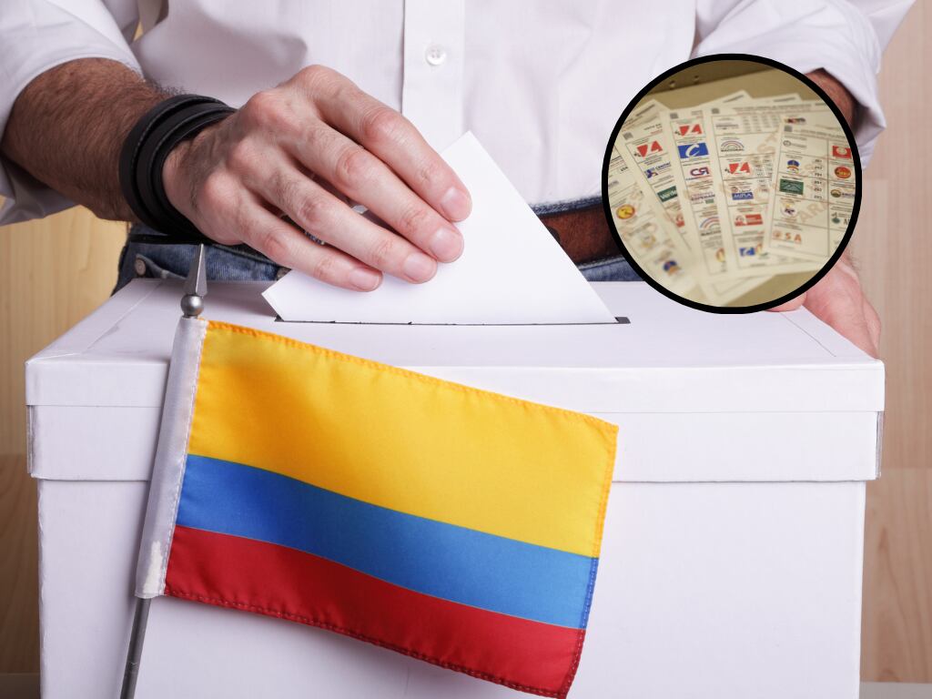 Persona depositando su voto en una urna con la bandera de Colombia. Imagen de referencia. (Getty)