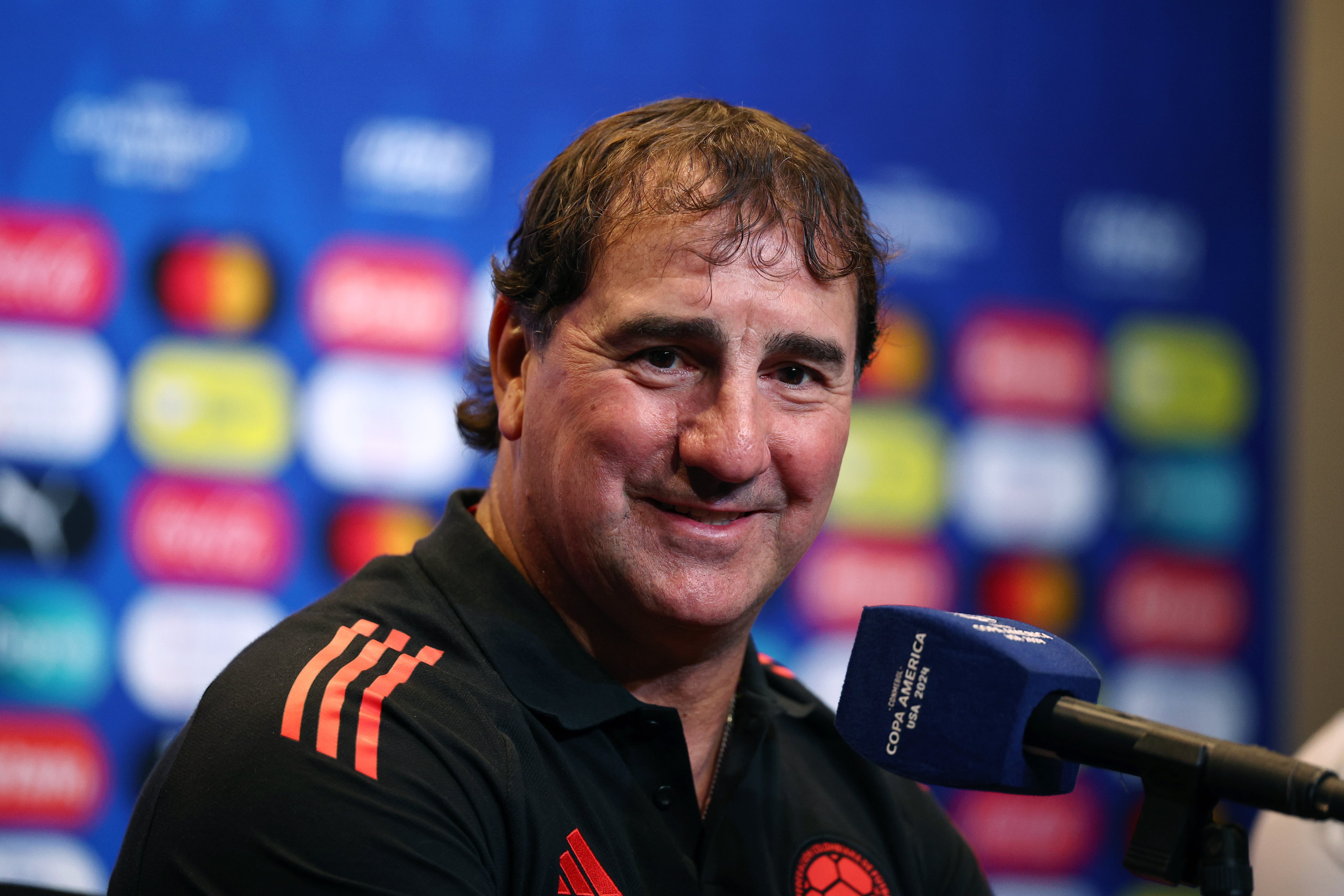 CHARLOTTE, NORTH CAROLINA - JULY 09: Head coach Nestor Lorenzo of Colombia speaks with the media during a press conference ahead of their semi final match against Uruguay as part of CONMEBOL Copa America USA 2024 at Bank of America Stadium on July 09, 2024 in Charlotte, North Carolina.  (Photo by Jared C. Tilton/Getty Images)