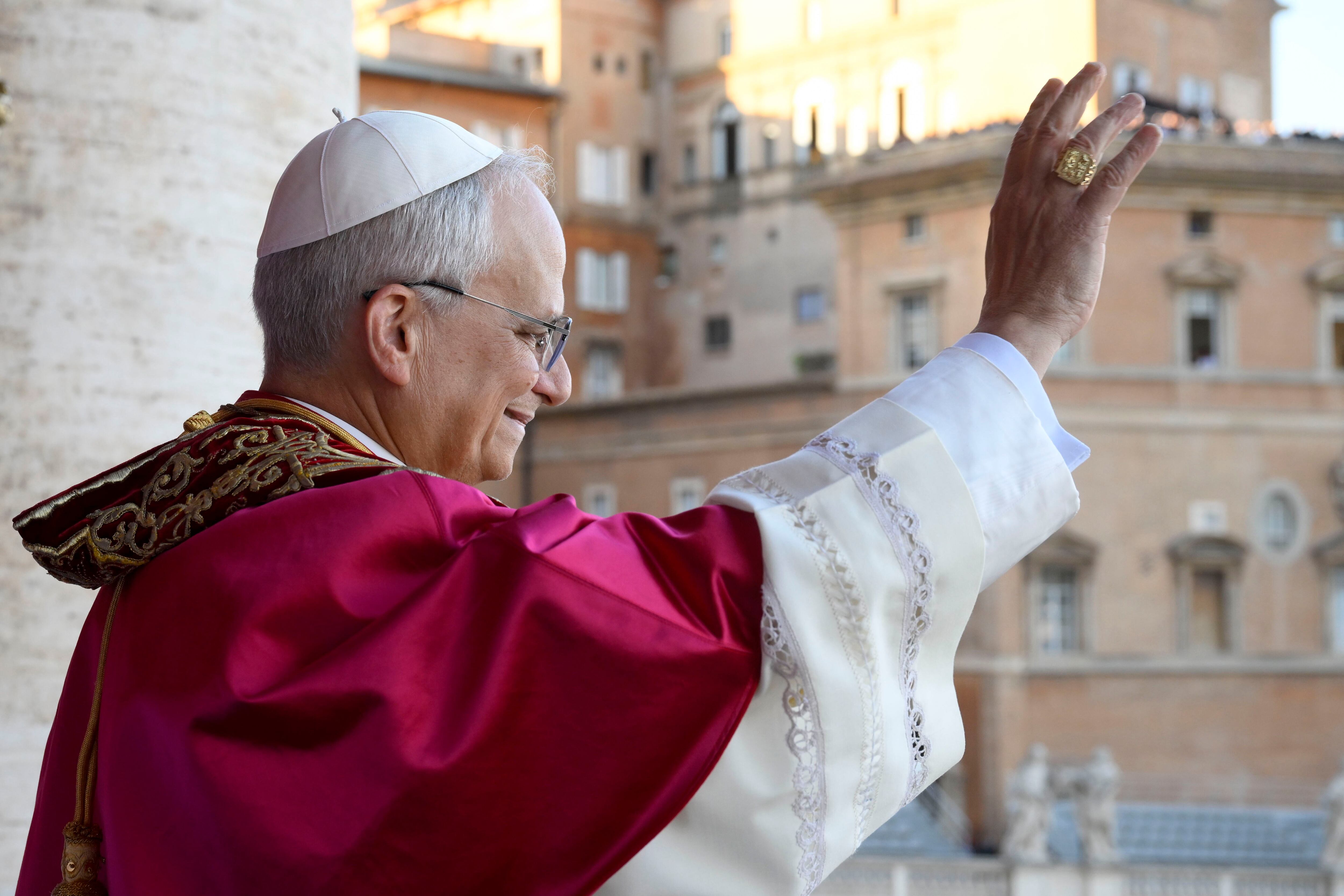 VATICAN CITY, VATICAN - MAY 08: (EDITOR NOTE: STRICTLY EDITORIAL USE ONLY - NO MERCHANDISING). Newly elected Pope Leo XIV, Robert Prevost addresses the crowd on the main central loggia balcony overlooking St Peter's Square on May 08, 2025 in Vatican City, Vatican. White smoke was seen over the Vatican early this evening as the Conclave of Cardinals took just two days to elect Cardinal Robert Francis Prevost, who will be known as Pope Leo  (Leone)  XIV, as the 267th Supreme Pontiff after the death of Pope Francis on Easter Monday. (Photo by Francesco Sforza - Vatican Media via Vatican Pool/Getty Images)