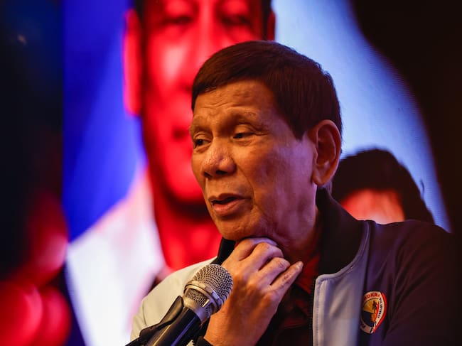 METRO MANILA, PHILIPPINES - 13 FEBRUARY: Former Philippines President Rodrigo Duterte delivers a speech during an election rally for his party Partido Demokratiko Pilipino, as Midterm Elections campaigns are underway amid a fractured political backdrop, in Metro Manila, Philippines, on February 13, 2025. The Southeast Asian country with a population of 117.3 million is expected to see fierce competitions between candidates running for local offices, senate, and the congress, with a focus on issues such as poverty, inflation, drug war, teenage pregnancy, food security, economy and climate change. There is also an escalating feud between the impeached Vice President Sara Duterte (the daughter of Rodrigo Duterte) and President Ferdinand Marcos Jr. (Photo by Daniel Ceng/Anadolu via Getty Images)
