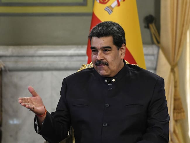CARACAS, VENEZUELA - JANUARY 24: President of Venezuela Nicolas Maduro gestures during a meeting with Spain Ambassador Ramon Santos Martinez (not in frame) the day after the announcement that he will not attend the VII Summit of the Community of Latin American and Caribbean States (CELAC)in Buenos Aires at Miraflores Palace on January 24, 2023 in Caracas, Venezuela. The Ministry of Foreign affairs had informed that Maduro will not participate in the meeting due to security reasons and denounced a plan of the &quot;neo-fascist right&quot; against the Venezuelan ruler. (Photo by Carlos Becerra/Getty Images)