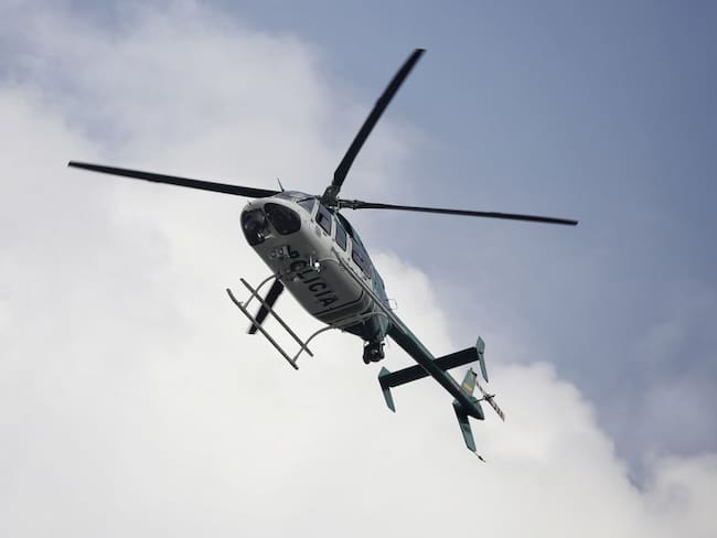 Muere policía al caer de un helicóptero durante operativo