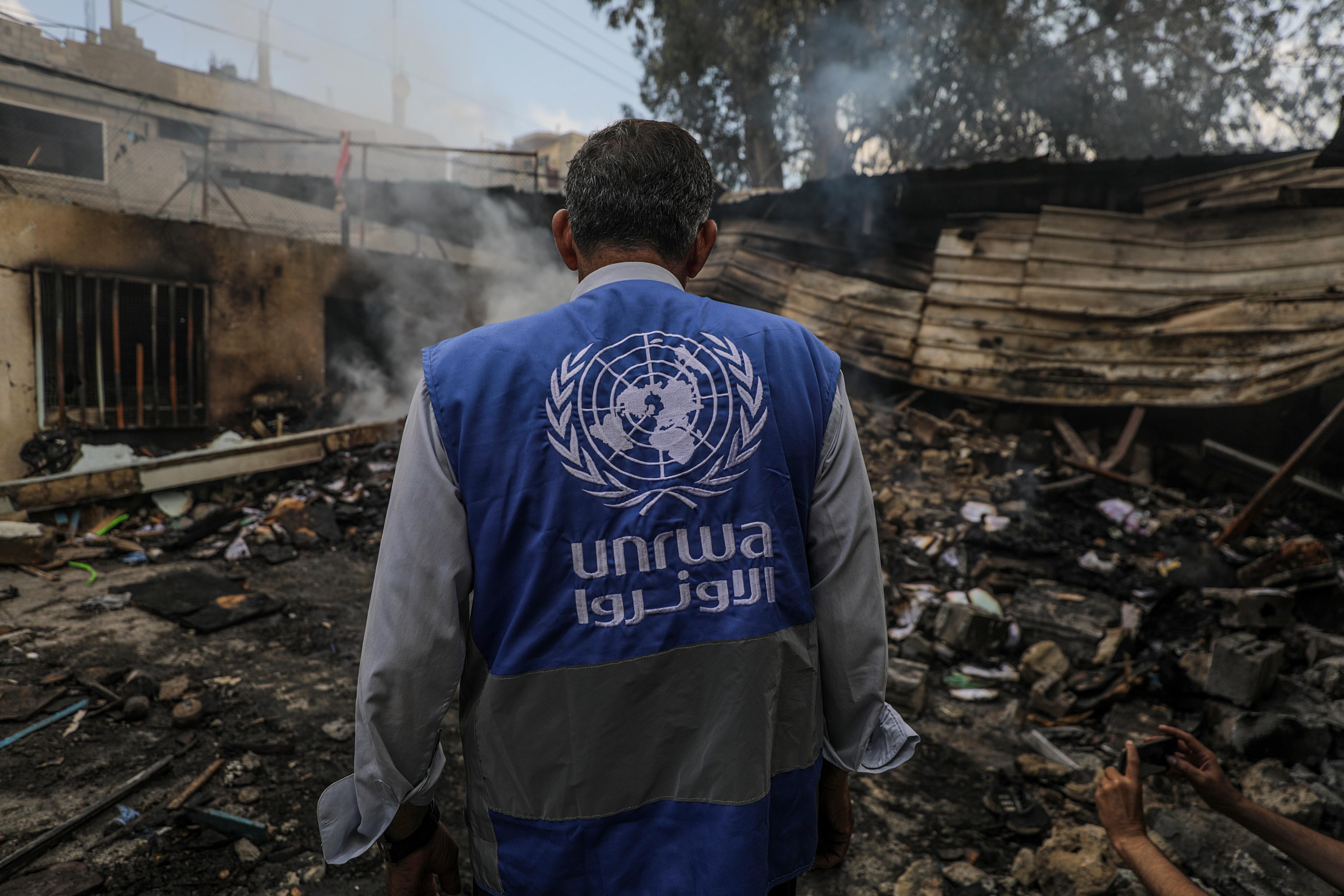 Al Nuseirat Camp (-), 14/05/2024.- An UNRWA employee inspects a destroyed United Nations school following an air strike in Al Nuseirat refugee camp, central Gaza Strip, 14 May 2024. At least six people were killed in the strike which hit the UNRWA (United Nationas Relief and Works Agency for Palestinians in the near east) school, according to the Palestinian Civil Defense in Gaza. More than 35,000 Palestinians and over 1,455 Israelis have been killed, according to the Palestinian Health Ministry and the Israel Defense Forces (IDF), since Hamas militants launched an attack against Israel from the Gaza Strip on 07 October 2023, and the Israeli operations in Gaza and the West Bank which followed it. EFE/EPA/MOHAMMED SABER