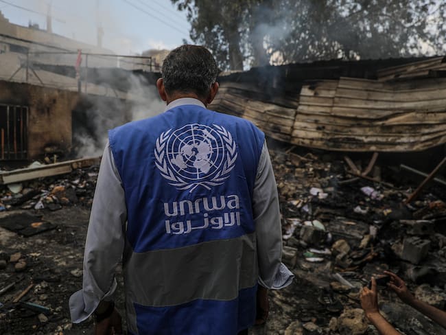 Al Nuseirat Camp (-), 14/05/2024.- An UNRWA employee inspects a destroyed United Nations school following an air strike in Al Nuseirat refugee camp, central Gaza Strip, 14 May 2024. At least six people were killed in the strike which hit the UNRWA (United Nationas Relief and Works Agency for Palestinians in the near east) school, according to the Palestinian Civil Defense in Gaza. More than 35,000 Palestinians and over 1,455 Israelis have been killed, according to the Palestinian Health Ministry and the Israel Defense Forces (IDF), since Hamas militants launched an attack against Israel from the Gaza Strip on 07 October 2023, and the Israeli operations in Gaza and the West Bank which followed it. EFE/EPA/MOHAMMED SABER