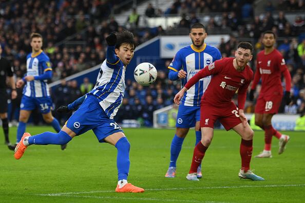 BRIGHTON, ENGLAND - JANUARY 29: Kaoru Mitoma of Brighton & Hove Albion tees the ball up to score the winning goal during the Emirates FA Cup Fourth Round match between Brighton & Hove Albion and Liverpool at Amex Stadium on January 29, 2023 in Brighton, England. (Photo by Mike Hewitt/Getty Images)
