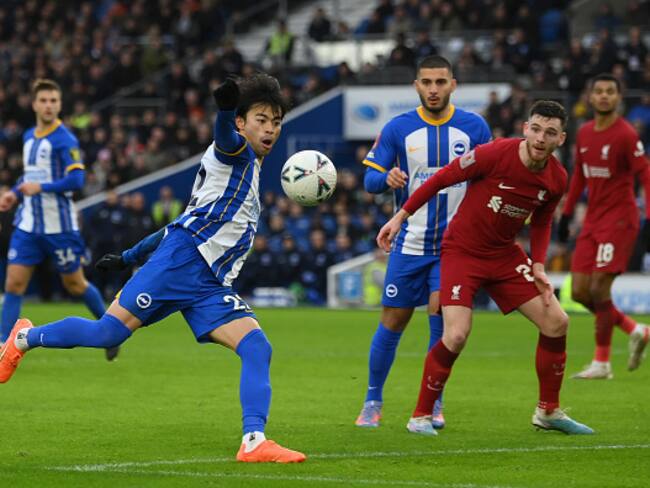 BRIGHTON, ENGLAND - JANUARY 29: Kaoru Mitoma of Brighton & Hove Albion tees the ball up to score the winning goal during the Emirates FA Cup Fourth Round match between Brighton & Hove Albion and Liverpool at Amex Stadium on January 29, 2023 in Brighton, England. (Photo by Mike Hewitt/Getty Images)
