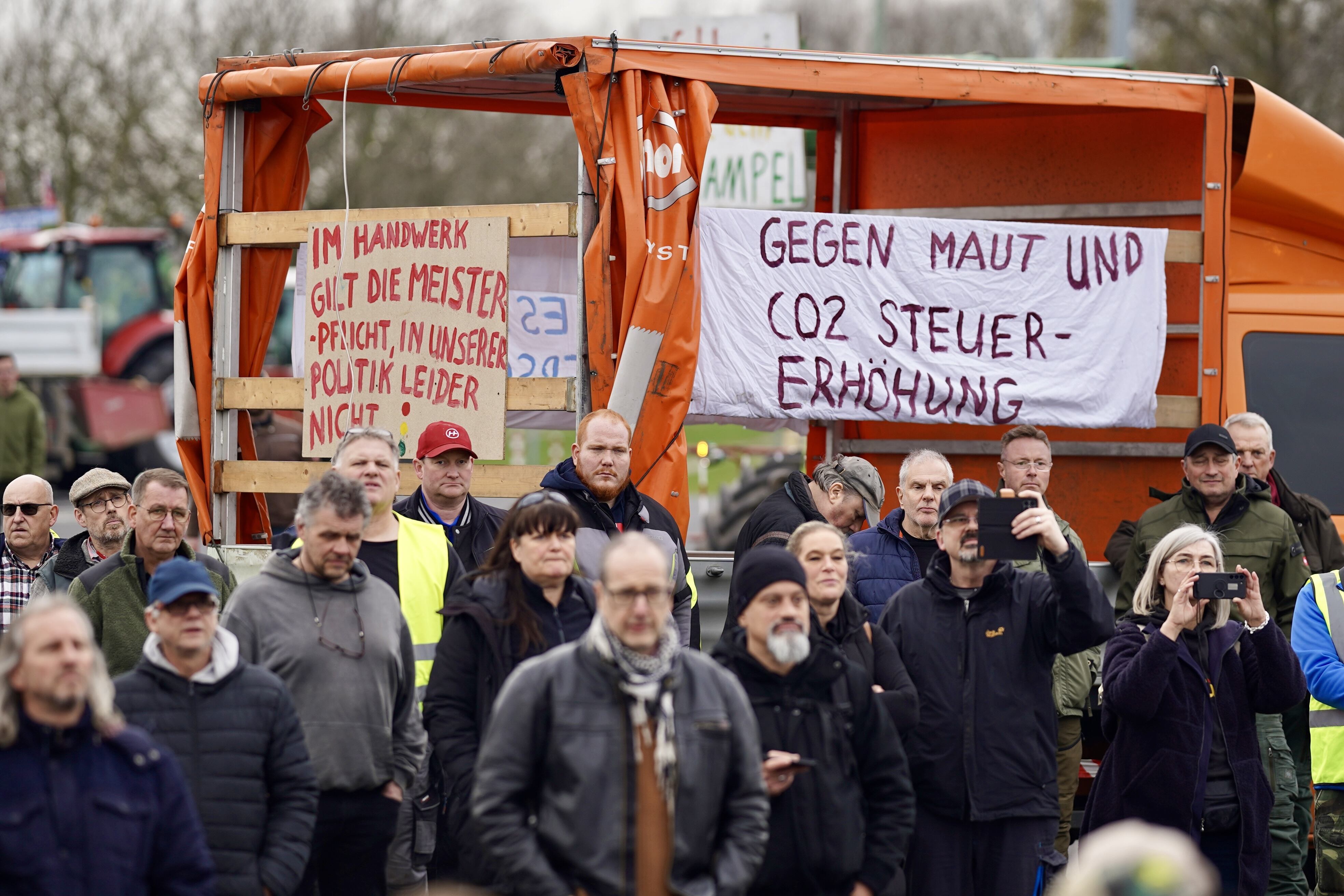 DUSSELDORF, GERMANY - FEBRUARY 17: Farmers gather to stage protest against the coalition government's agricultural policies as they convoy with tractors and other agricultural vehicles in Dusseldorf, Germany on February 17, 2024. (Photo by Kadir lboa/Anadolu via Getty Images)