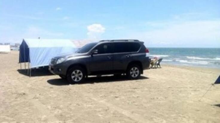 Apartan del cargo a escolta que metió camioneta de congresista a la playa