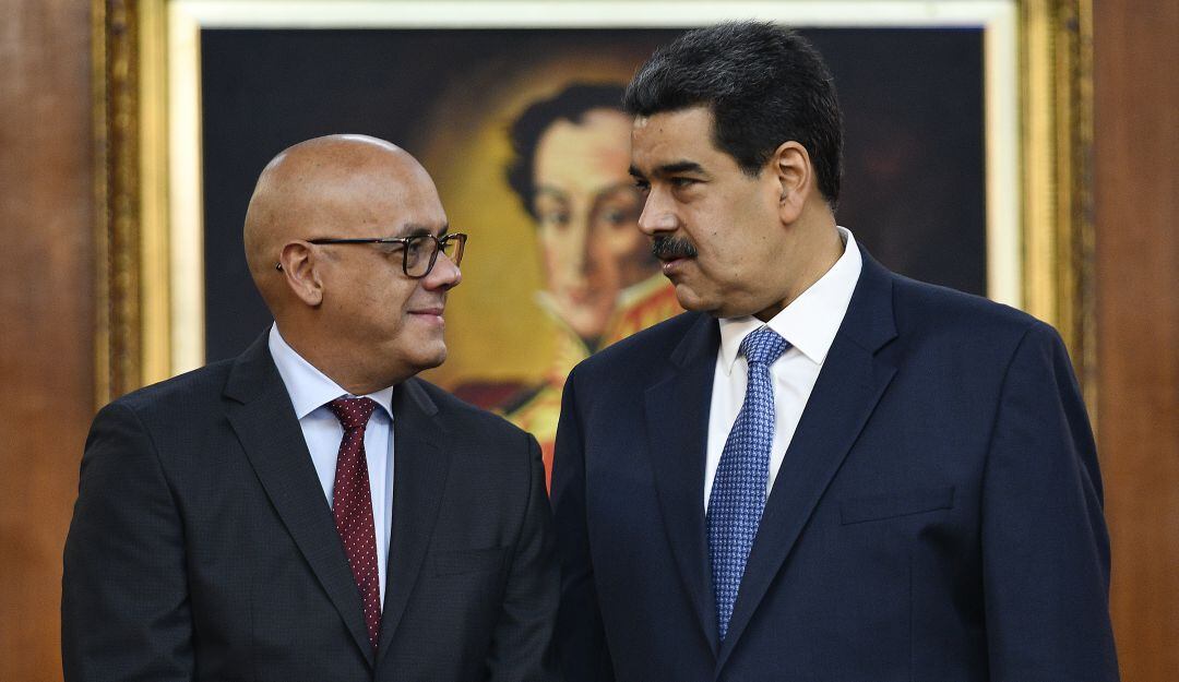 Jorge Rodríguez y Nicolás Maduro