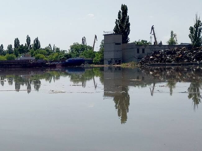 TOPSHOT - This general view shows a partially flooded area of Kherson on June 6, 2023, following damage sustained at Kakhovka hydroelectric dam. A Russian-held dam in southern Ukraine was damaged on June 6, with Kyiv and Moscow accusing each other of blowing it up while locals were forced to flee rising waters. The dam was partially destroyed by "multiple strikes", Moscow-installed authorities claimed just as expectations were rising over the start of Ukraine's long-awaited offensive. (Photo by Sergiy Dollar / AFP) (Photo by SERGIY DOLLAR/AFP via Getty Images)
