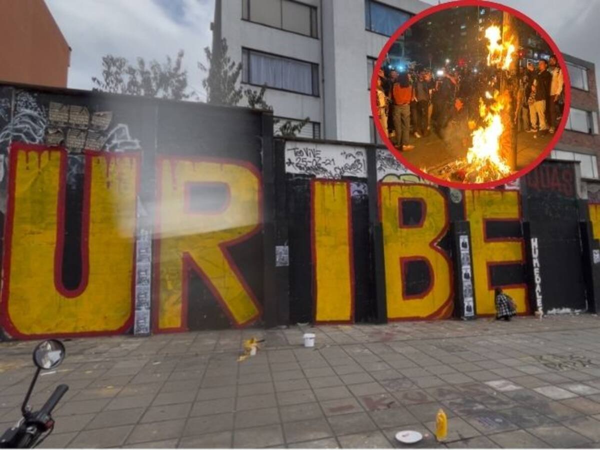 Juicio a Uribe: Manifestantes pintan mural cerca a la Universidad Javeriana en Bogotá