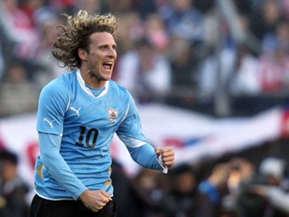 Luis Suárez y Forlán dan a Uruguay un título de récord