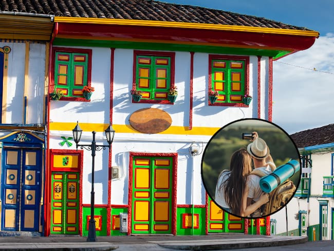 Turistas tomando una fotografía del pisaje y de fondo casas coloridas del Eje Cafetero colombiano (Fotos vía Getty Images).