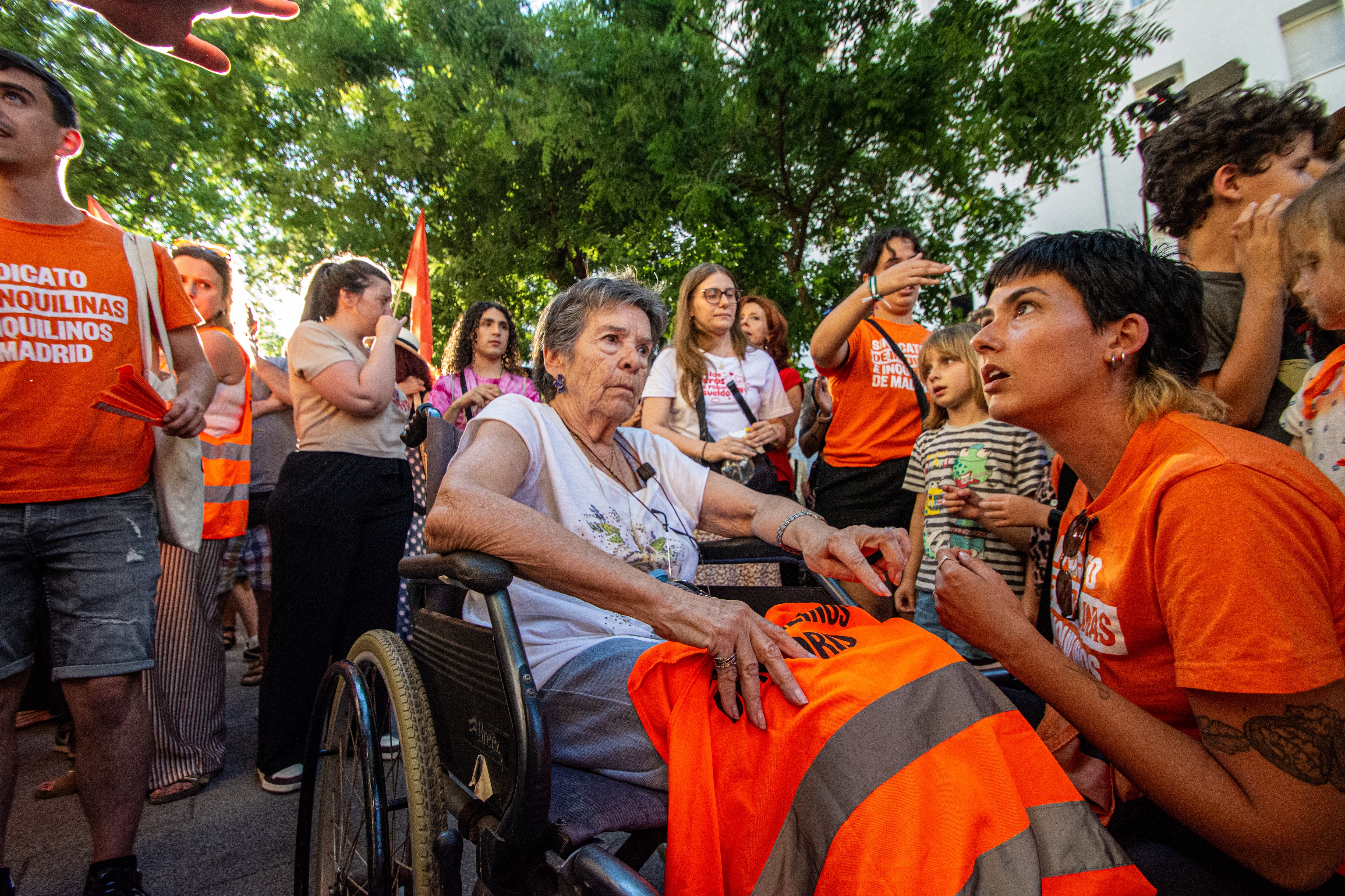 Maricarmen Abascal, 87, is inside her home on Calle Alcalde Sainz de Baranda in Madrid, on June 2, 2026, where she had lived for more than 70 years. On September 23, the fourth attempt to evict her was carried out. Hundreds of people spent the night outside the building in an effort to prevent the eviction. At dawn, Spanish National Police cordoned off the area and removed protesters, with moments of tension and pushing reported during the operation. Court officials entered the building and Abascal was eventually carried out on a stretcher and taken away in an ambulance. (Photo by Francesco Militello Mirto/NurPhoto) (Photo by Francesco Militello Mirto / NurPhoto via AFP)