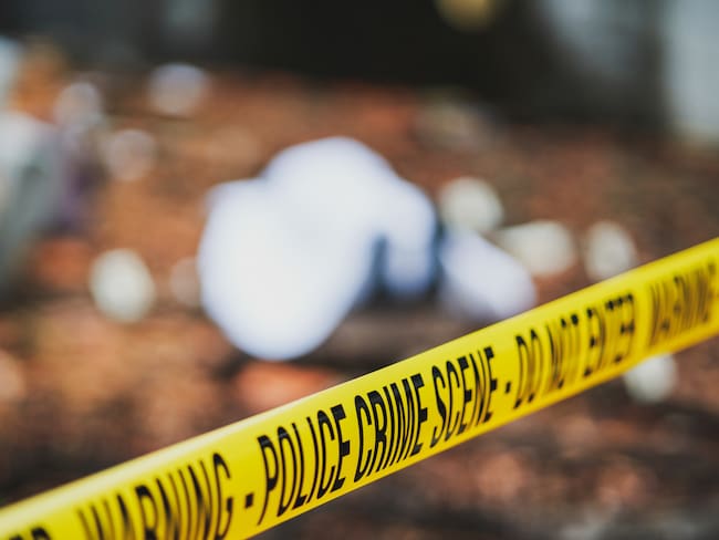 a series of photos showing a visit to a crime scene. investigators are investigating a murder with a firearm