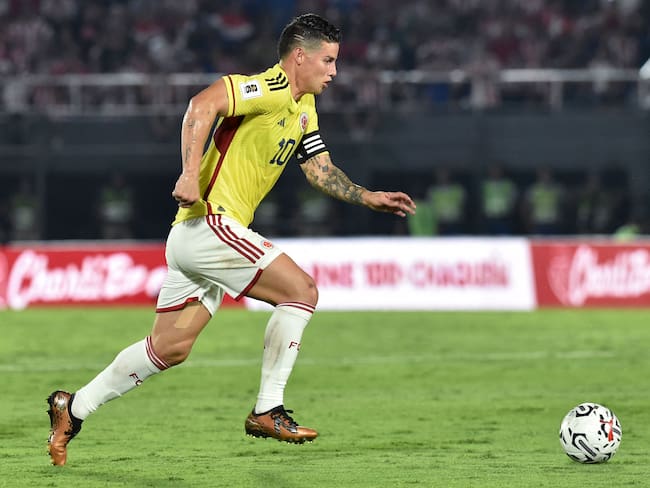 Colombia&#039;s midfielder James Rodriguez runs with the ball during the 2026 FIFA World Cup South American qualification football match between Paraguay and Colombia at the Defensores del Chaco stadium in Asuncion on November 21, 2023. (Photo by NORBERTO DUARTE / AFP) (Photo by NORBERTO DUARTE/AFP via Getty Images)