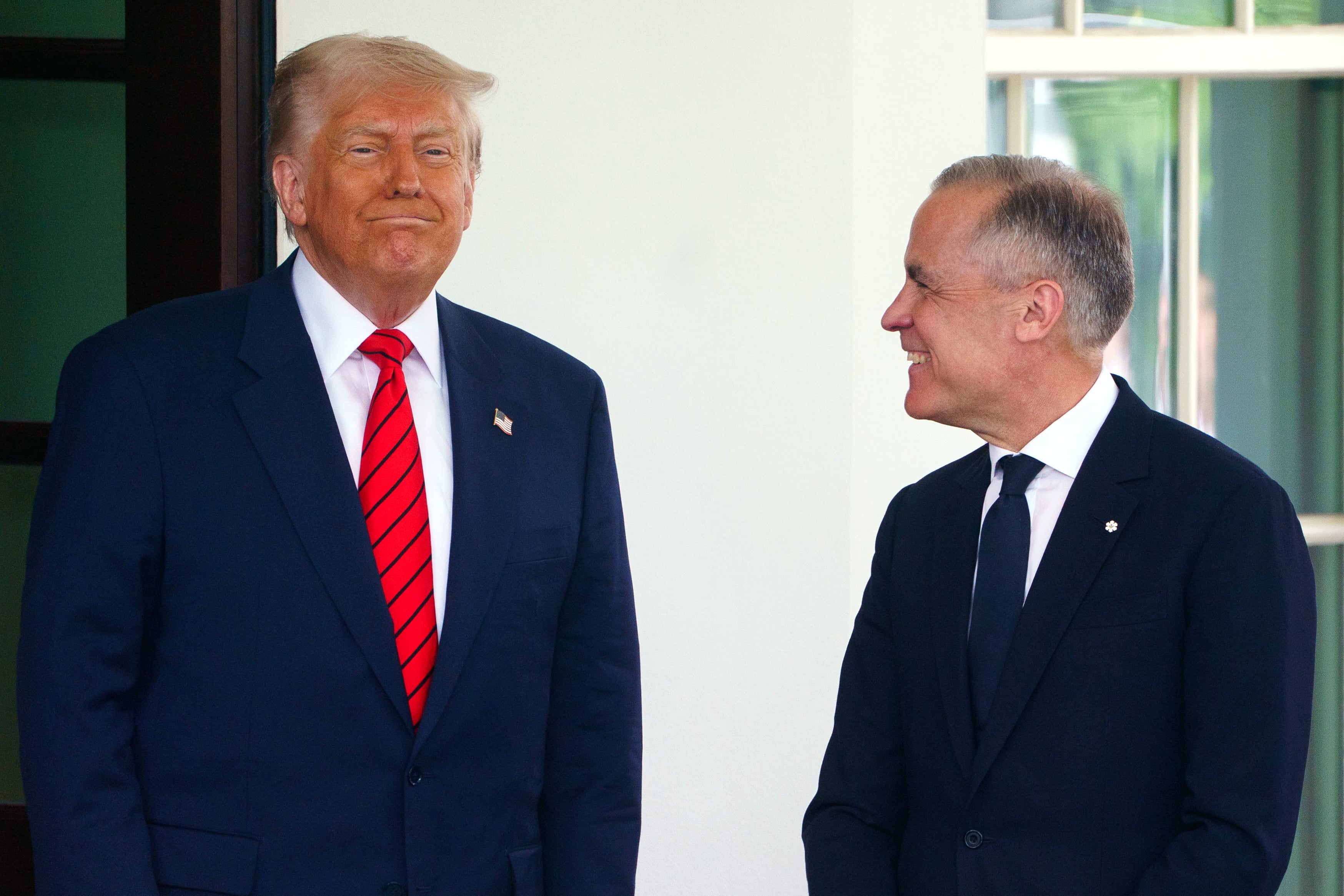 US President Donald Trump (L) greets Canadian Prime Minister Mark Carney at the White House in Washington, DC, USA, 06 May 2025. EFE/EPA/WILL OLIVER