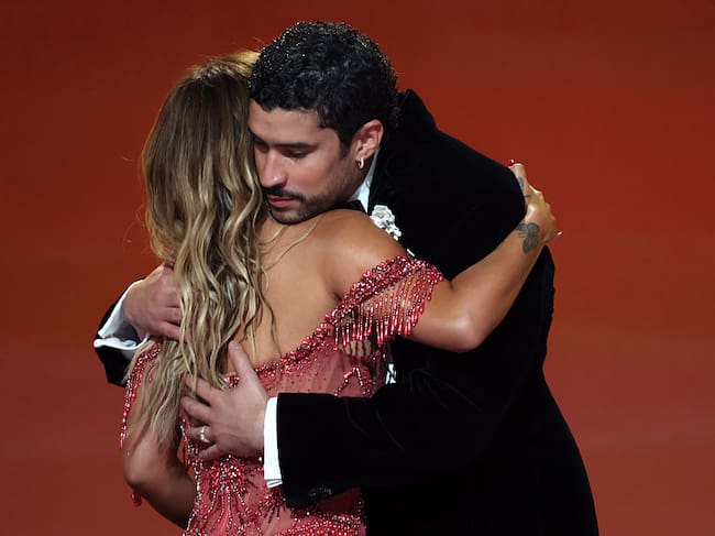 LOS ANGELES, CALIFORNIA - FEBRUARY 01: Bad Bunny accepts the Best Música Urbana Album award for "DeBÍ TiRAR MáS FOToS" from Karol G onstage during the 68th GRAMMY Awards at Crypto.com Arena on February 01, 2026 in Los Angeles, California. (Photo by Kevin Mazur/Getty Images for The Recording Academy)