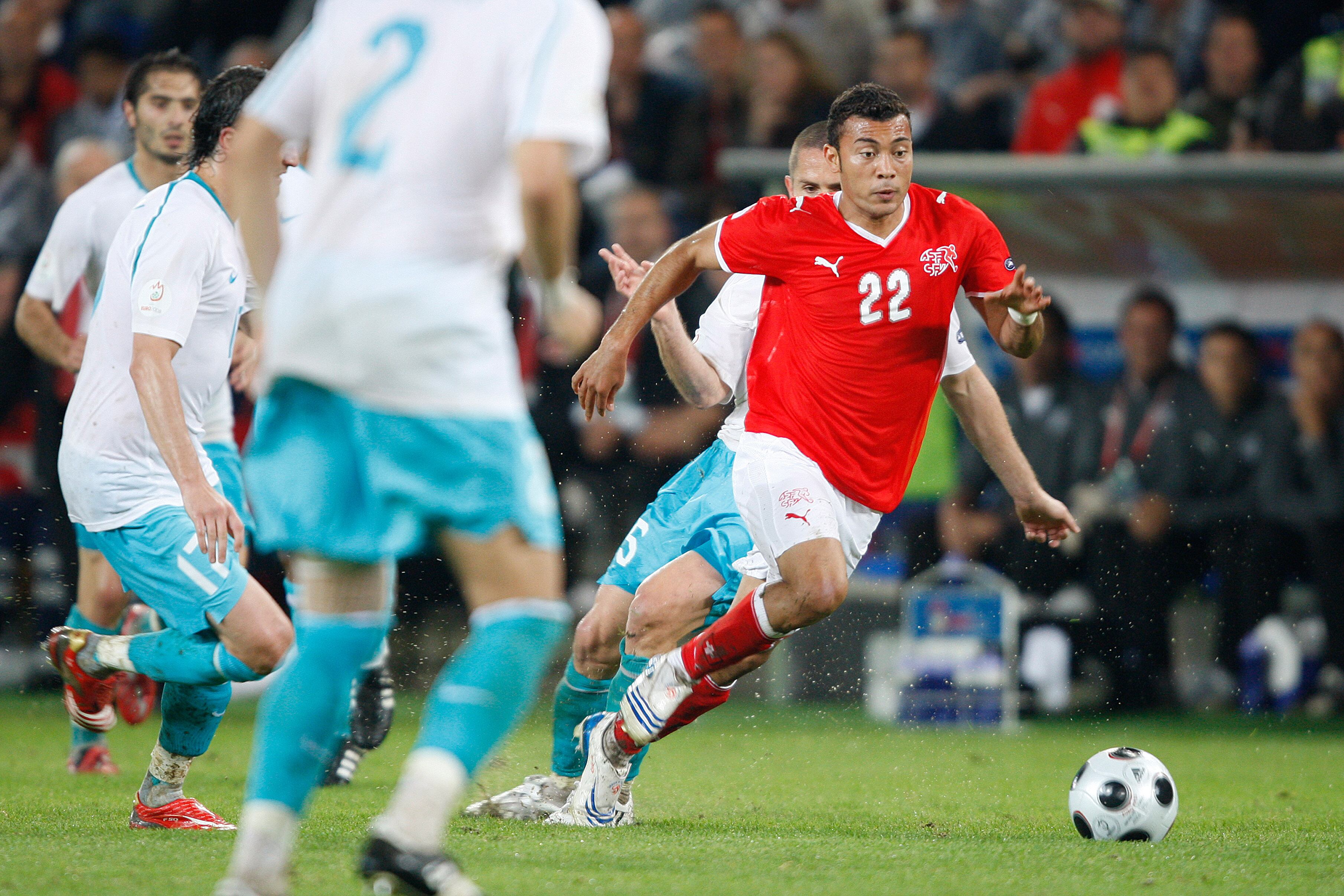, AUSTRIA - JUNE 11: Emre Asik of Turkey , Johan Vonlanthen of Switzerland during the EURO match between Switzerland v Turkey on June 11, 2008 (Photo by Eric Verhoeven/Soccrates/Getty Images)