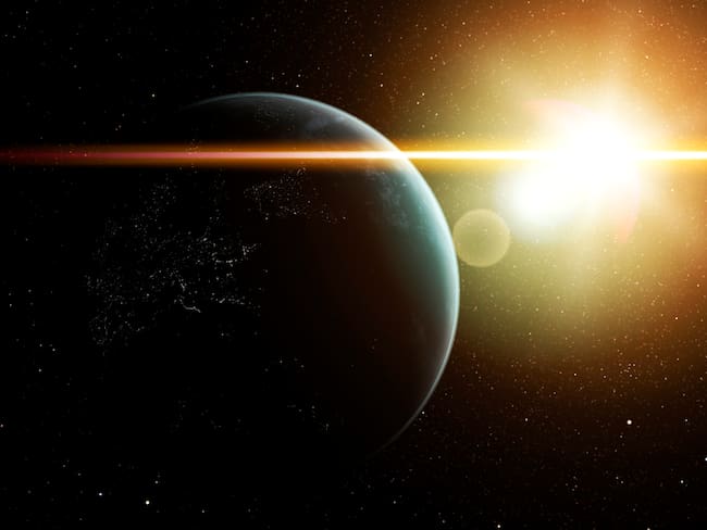 Ilustración de la Tierra y el Sol en el espacio (Foto vía Getty Images)