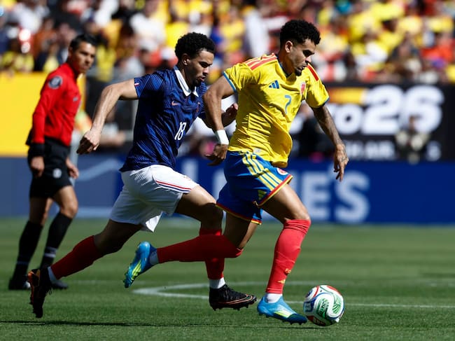 LANDOVER (United States), 29/03/2026.- Frances Warren Zaire-Emery (L) in action against Colombia's Luis Diaz (R) during the friendly soccer match between Colombia and France in Landover, Maryland, USA, 29 March 2026. (Futbol, Amistoso, Francia) EFE/EPA/WILL OLIVER