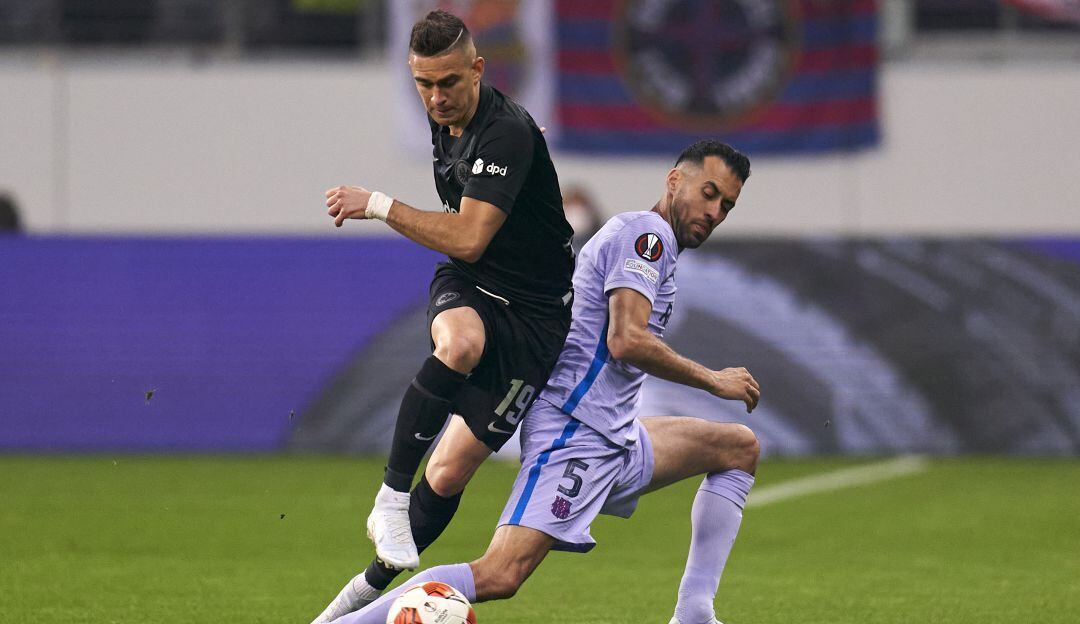 Rafael Santos Borré y Sergio Busquets