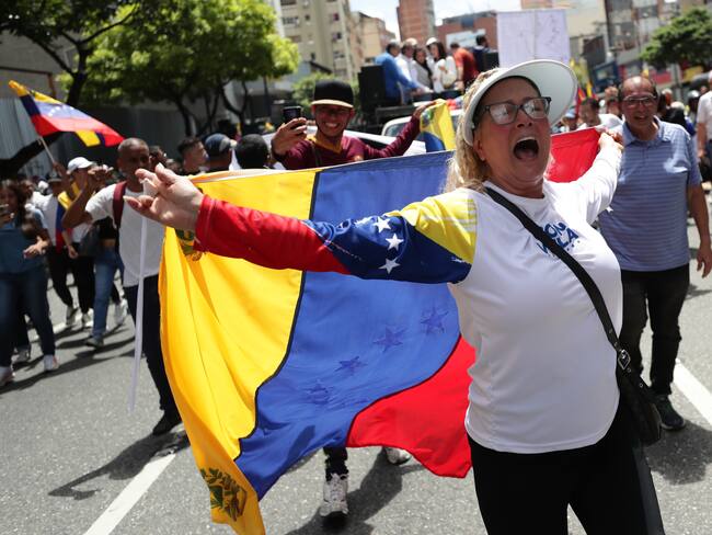 Venezolanos sueñan con la libertad de su país /EFE/ Ronald Peña