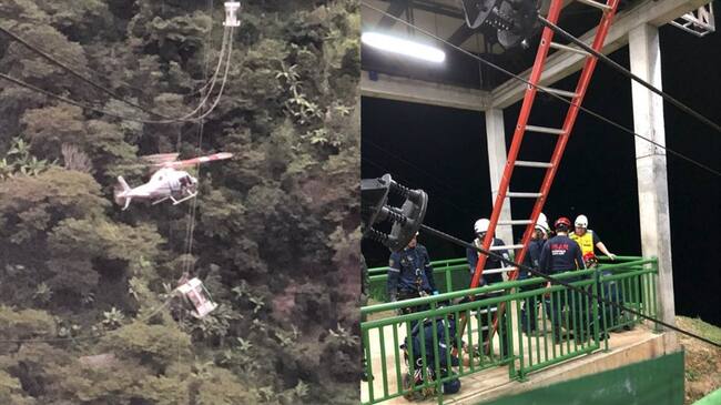 El descenso del cuerpo de rescate se hizo por parte de Bomberos Medellín, por los cables del sistema y posteriormente por cuerdas hacia tierra. Foto: Dagrd