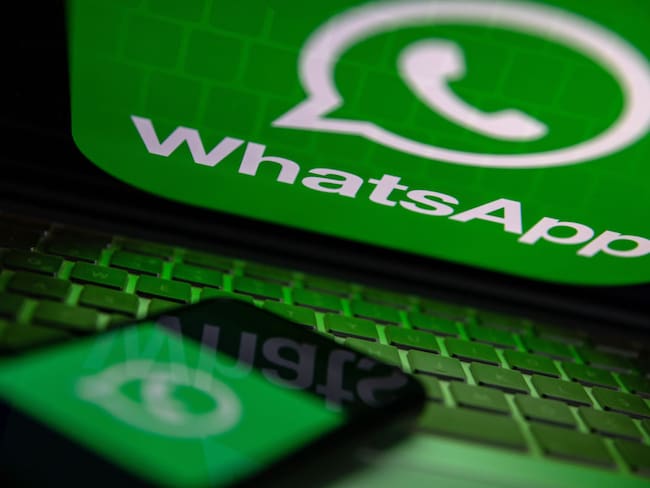TURKEY - 2022/10/25: In this photo illustration, a WhatsApp logo seen displayed on a smartphone screen and on a laptop. (Photo Illustration by Onur Dogman/SOPA Images/LightRocket via Getty Images)