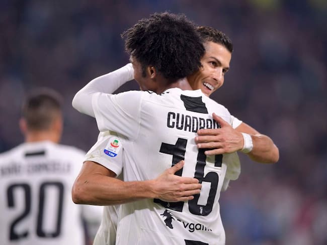 Juan Guillermo Cuadrado y Cristiano Ronaldo jugando junto en la Juventus en el 2018 / Getty Images