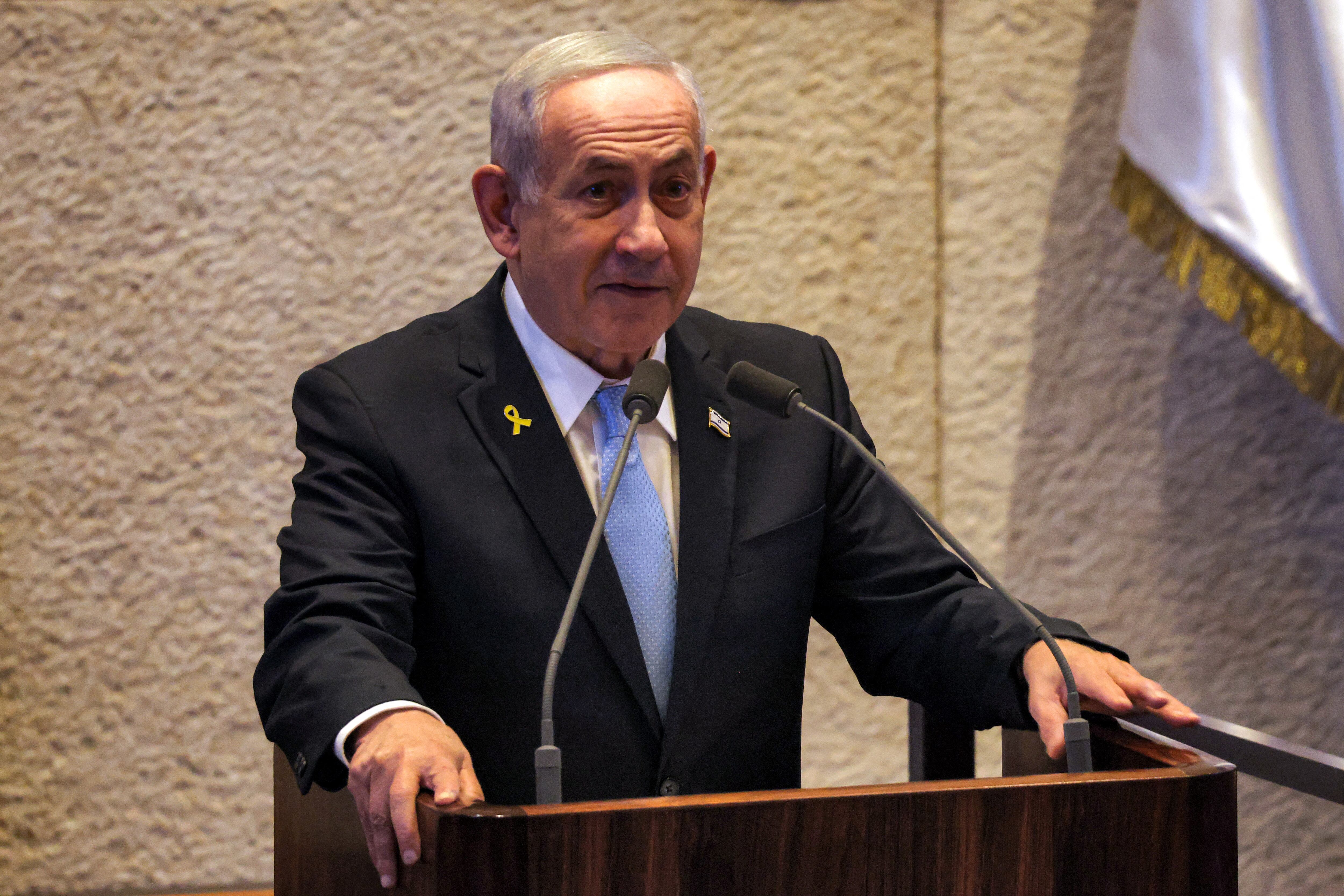 Israel's Prime Minister Benjamin Netanyahu addresses the assembly during a session of the Israeli parliament (Knesset) at its headquarters in Jerusalem on June 11, 2025. (Photo by Menahem KAHANA / AFP) (Photo by MENAHEM KAHANA/AFP via Getty Images)          