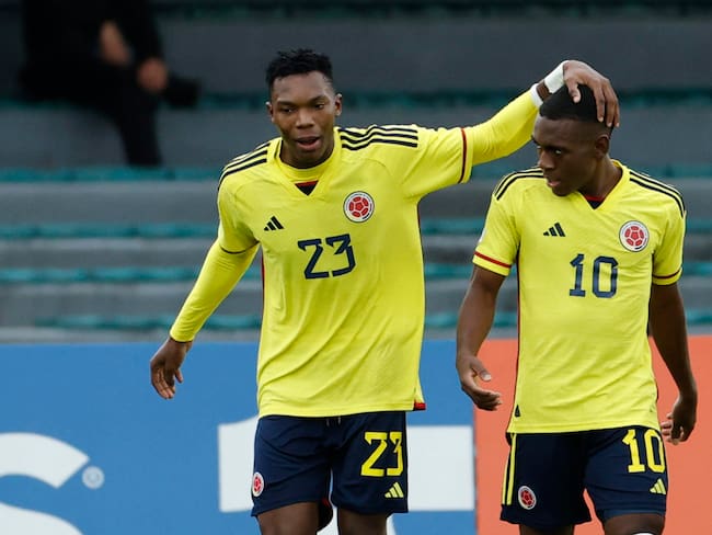Cabezas y Manyoma, los dos anotadores de los goles de Colombia ante Venezuela. EFE/ Mauricio Dueñas Castañeda
