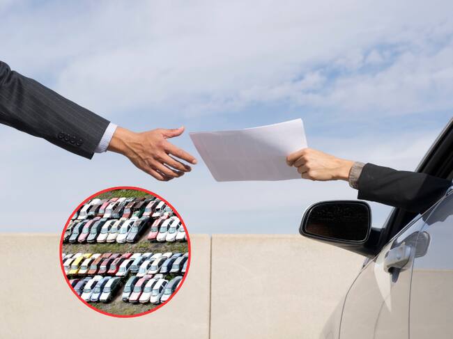 Carros inmovilizados en los patios y al fondo un conductor entregando un documento (Fotos vía Getty Images)
