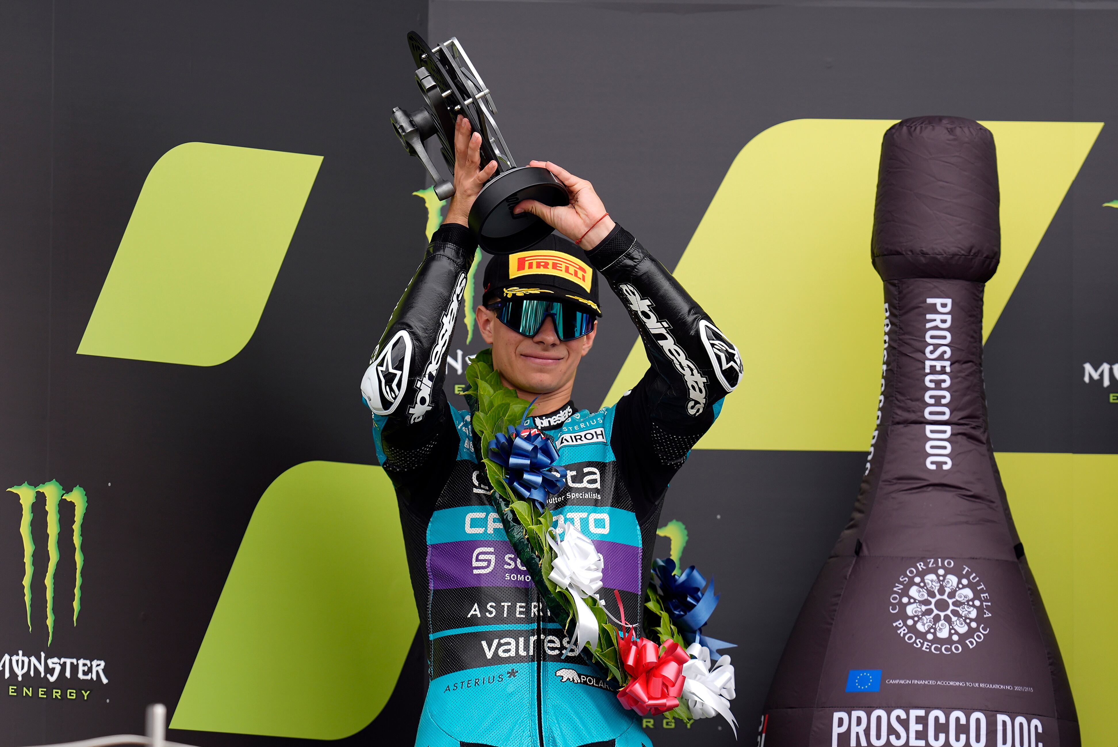 Silverstone (United Kingdom), 04/08/2024.- Colombia's David Alonso of CFMOTO Aspar Team celebrates the 2nd place in the Moto3 Race at the Motorcycling Grand Prix of Great Britain at the Silverstone race track, Britain, 04 August 2024. (Motociclismo, Ciclismo, Gran Bretaña, Reino Unido) EFE/EPA/TIM KEETON