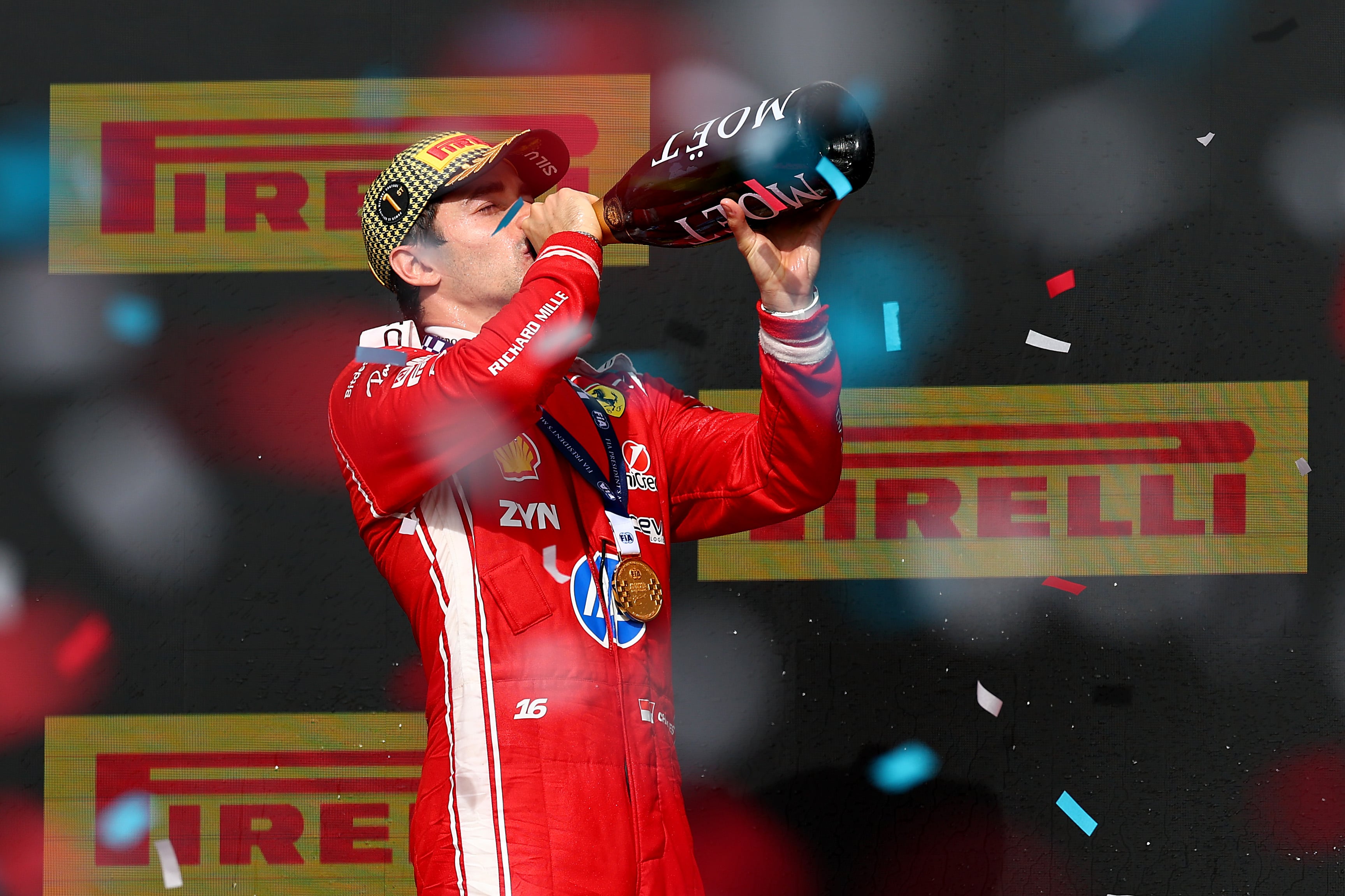 NORTHAMPTON, ENGLAND - JULY 05: Race winner Charles Leclerc of Monaco and Scuderia Ferrari celebrates on the podium with Champagne during the F1 Grand Prix of Great Britain at Silverstone Circuit on July 05, 2026 in Northampton, England. (Photo by Clive Mason/Getty Images)