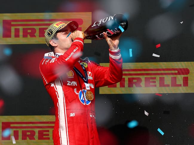 NORTHAMPTON, ENGLAND - JULY 05: Race winner Charles Leclerc of Monaco and Scuderia Ferrari celebrates on the podium with Champagne during the F1 Grand Prix of Great Britain at Silverstone Circuit on July 05, 2026 in Northampton, England. (Photo by Clive Mason/Getty Images)