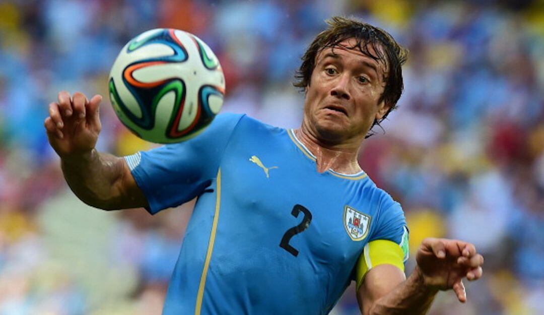 Diego Lugano durante un partido del Mundial Brasil 2014.
