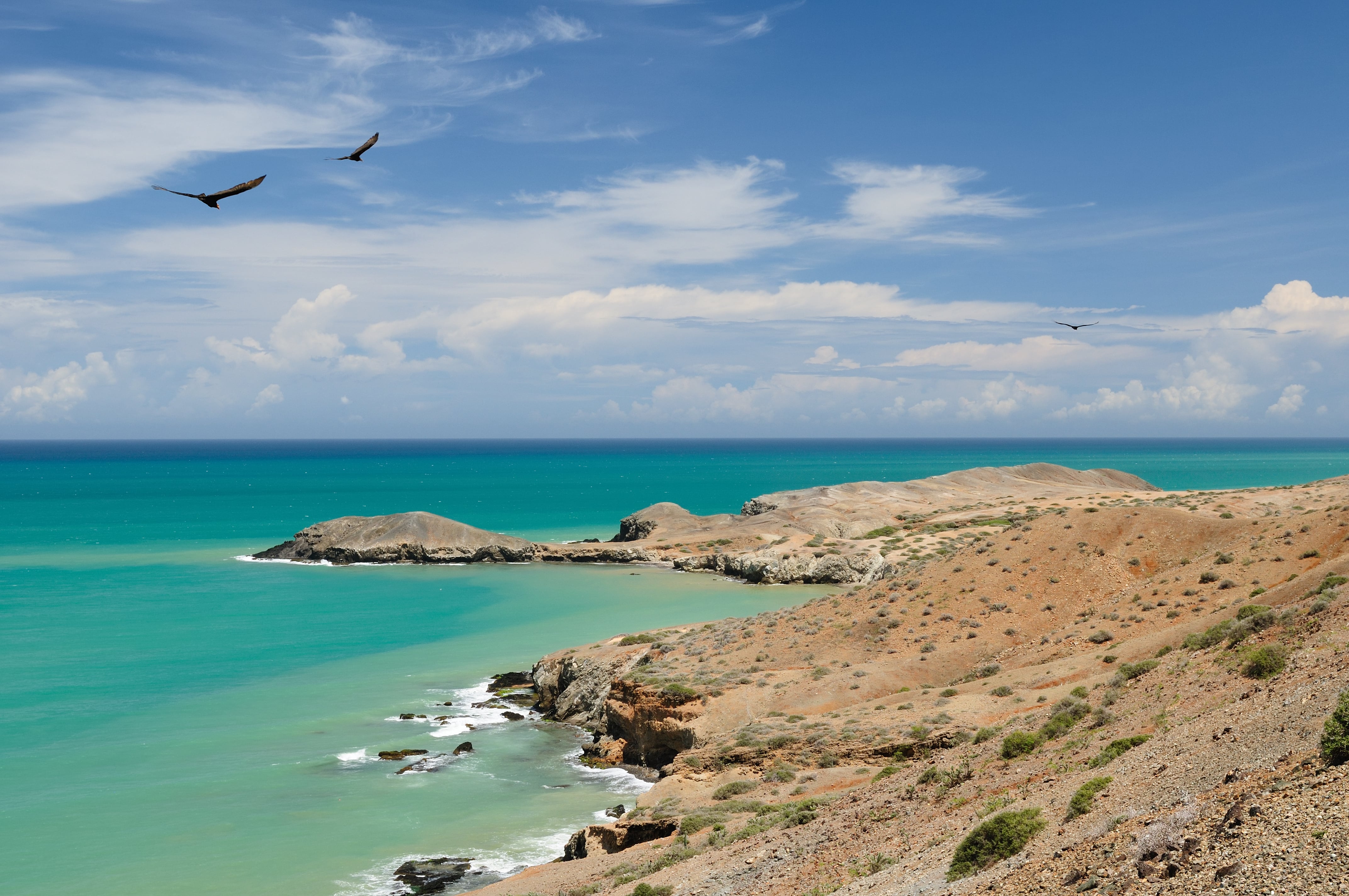 Colombia, wild coastal desert of Penisula la Guajira near the Cabo de la Vela resort. The picture present beautiful Caribbean coast with turquoise water and orange sand