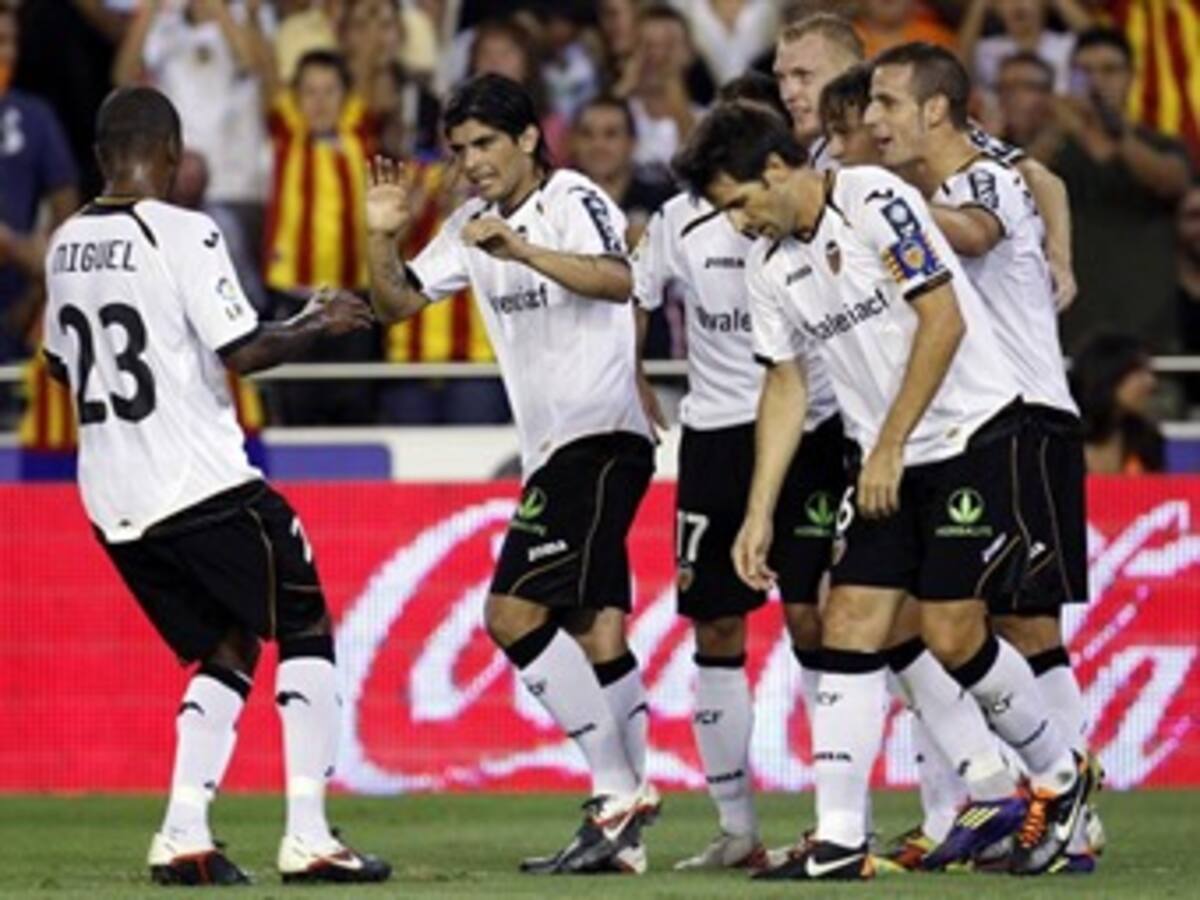 Real Madrid y Barcelona consiguieron empates mientras que Valencia lidera en España