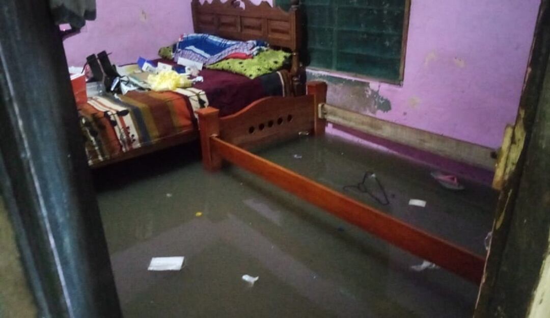 Una de las viviendas inundadas