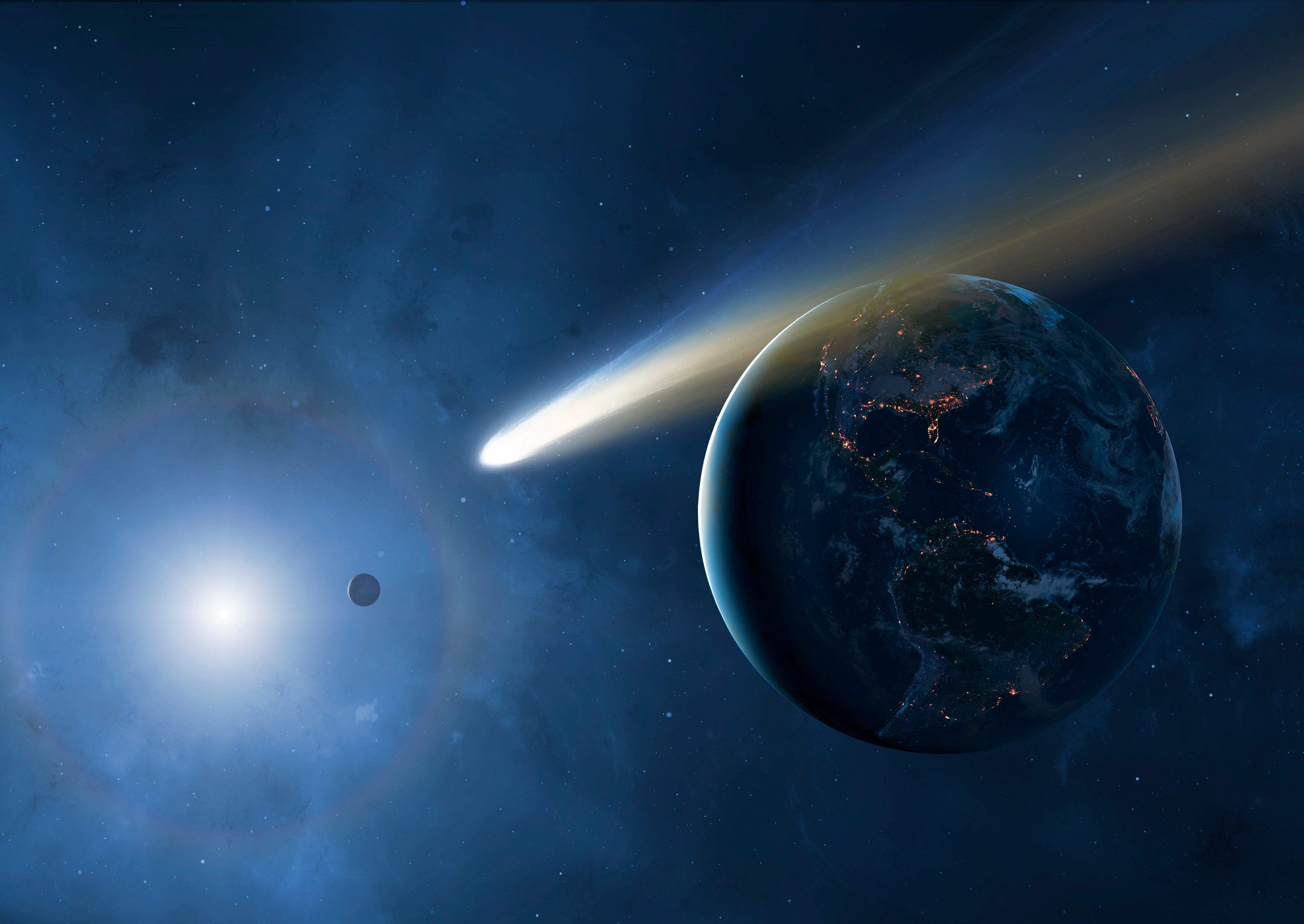 Ilustración de un cometa y la Tierra (Foto vía Getty Images)