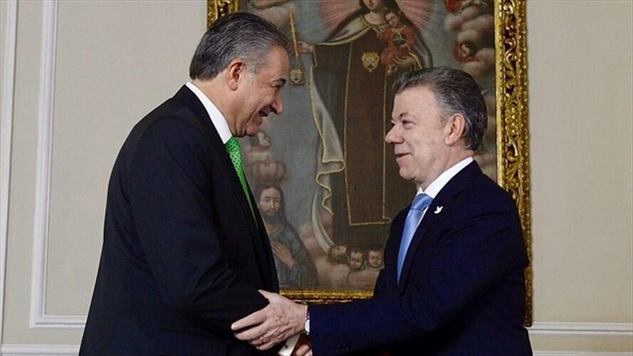 Óscar Naranjo y Juan Manuel Santos. Foto: Colprensa