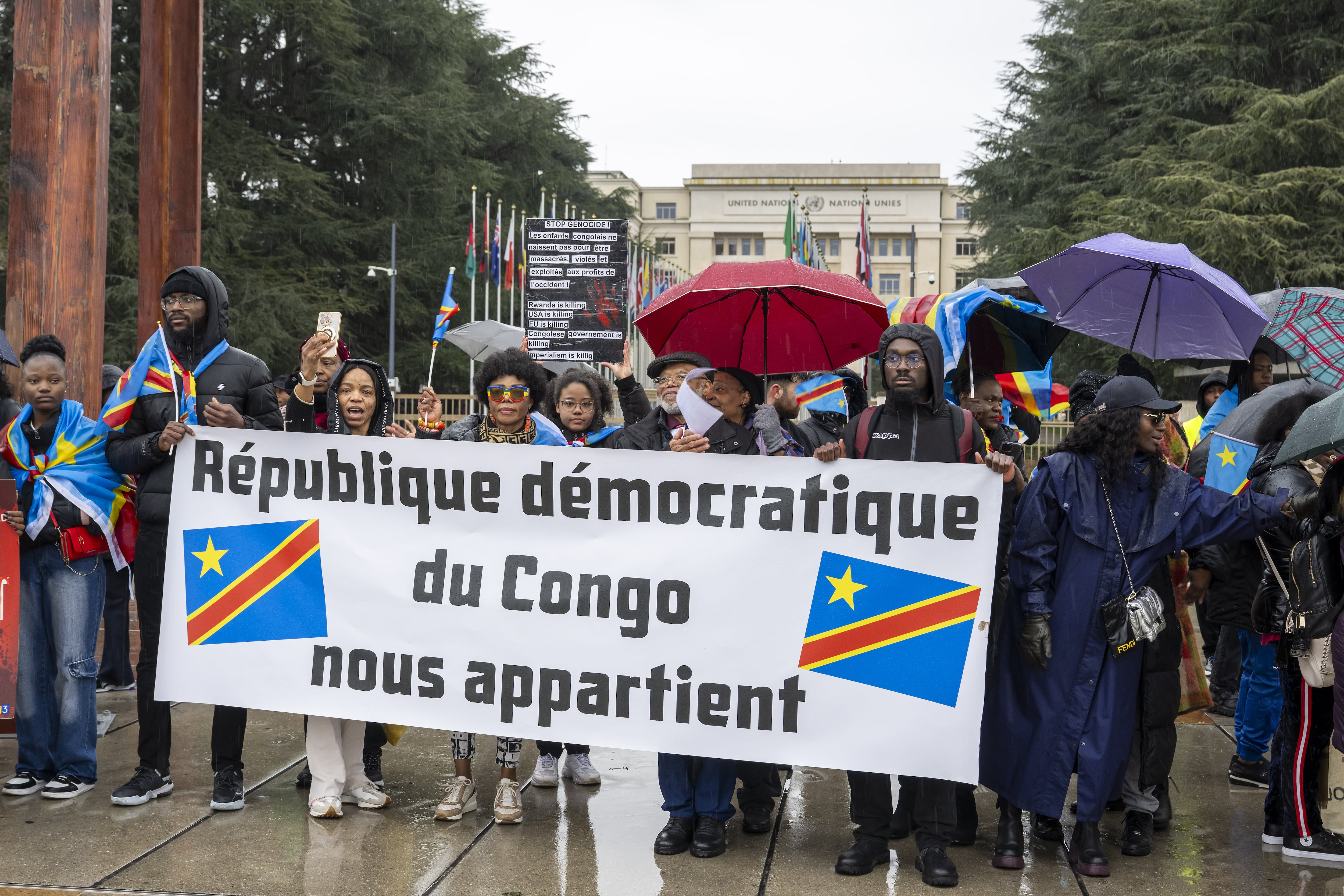 GENEVA (Switzerland), 14/03/2025.- People hold a demonstration to denounce Rwanda's aggression in the eastern part of the Democratic Republic of Congo, on Place des Nations in front of the European headquarters of the United Nations in Geneva, Switzerland, 14 March 2025. (Ruanda, Suiza, Ginebra) EFE/EPA/MARTIAL TREZZINI