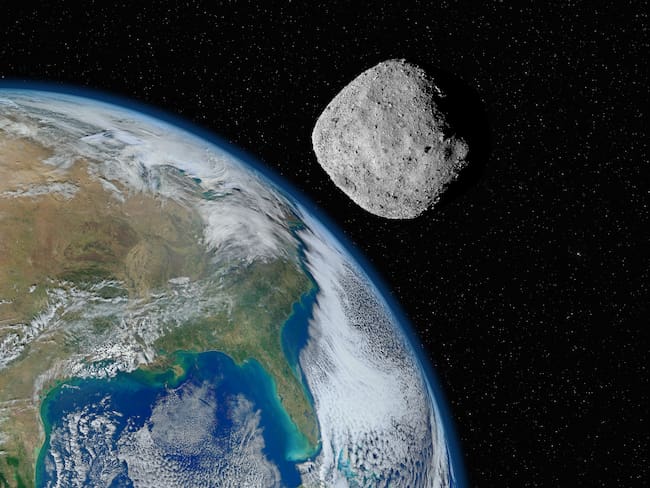 Peligroso asteroide acercándose al planeta Tierra, elementos de esta imagen proporcionada por la NASA vía Getty Images.