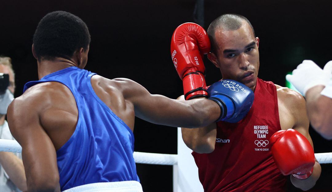 Euri Cedeno (azul) ante Eldric Sella (Rojo) en los Juegos Olímpicos de Tokio 2020