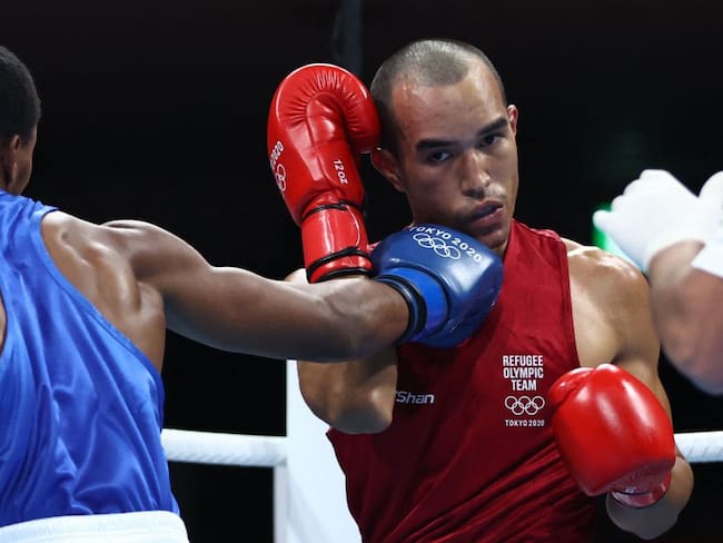 Euri Cedeno (azul) ante Eldric Sella (Rojo) en los Juegos Olímpicos de Tokio 2020